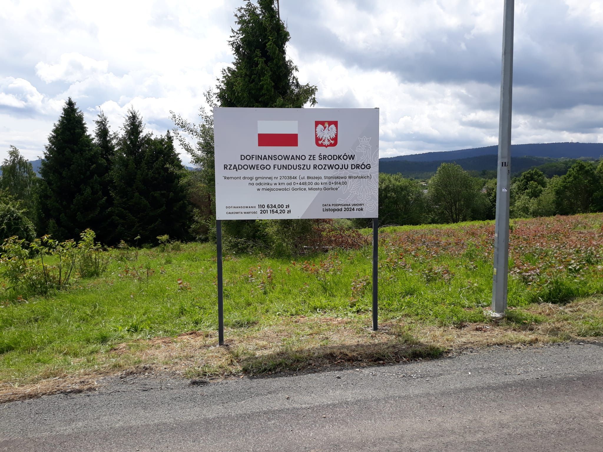 Tablica informacyjna na ul. Wrońskich.