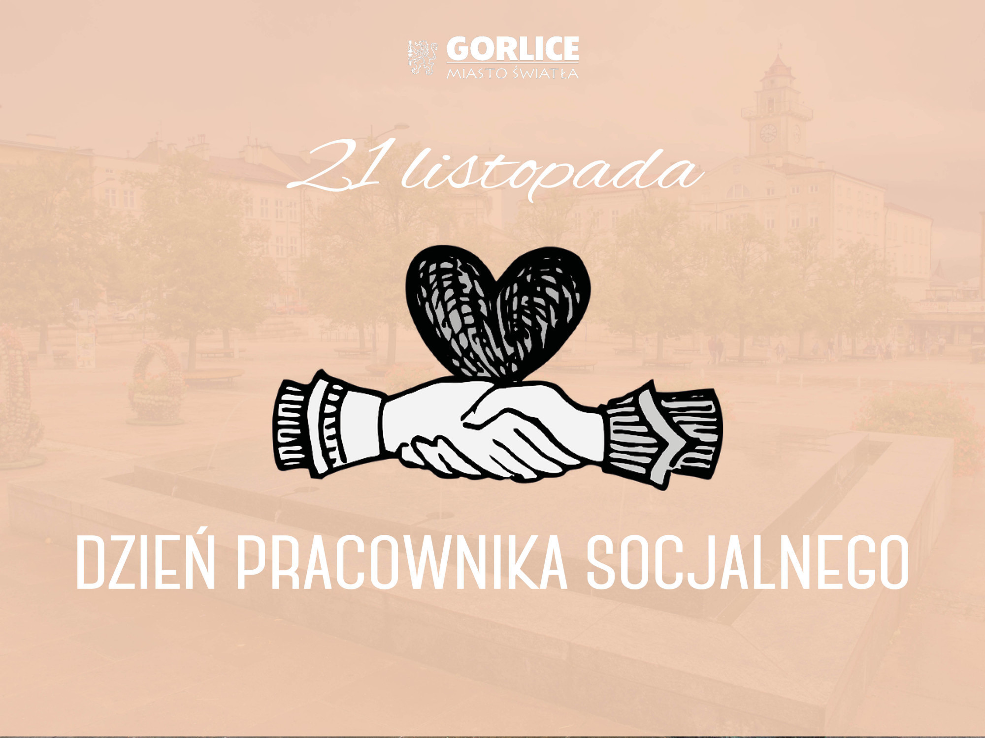 Baner na różowym tle z napisem Dzień pracownika socjalnego i dwie ręce w uścisku.